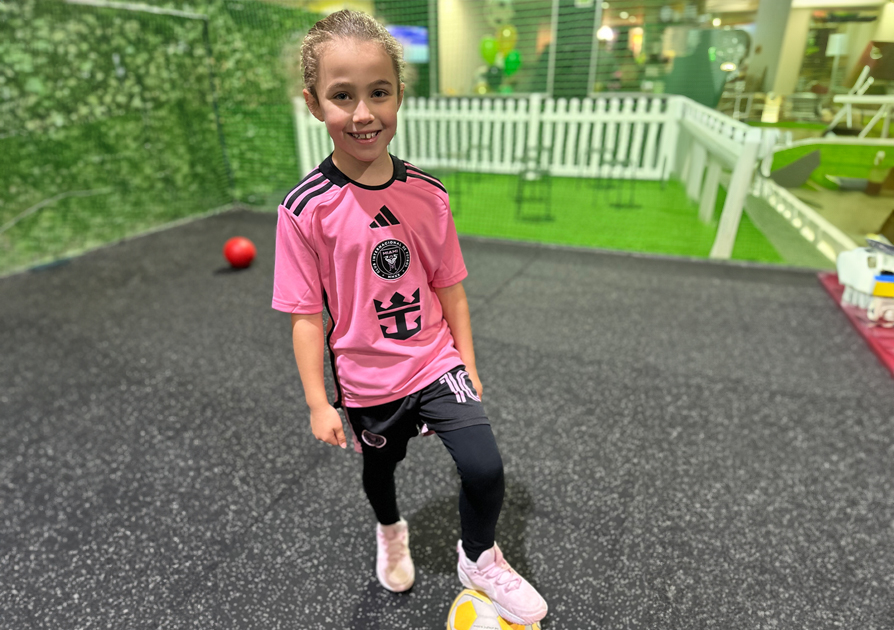 Birthday child with soccer ball