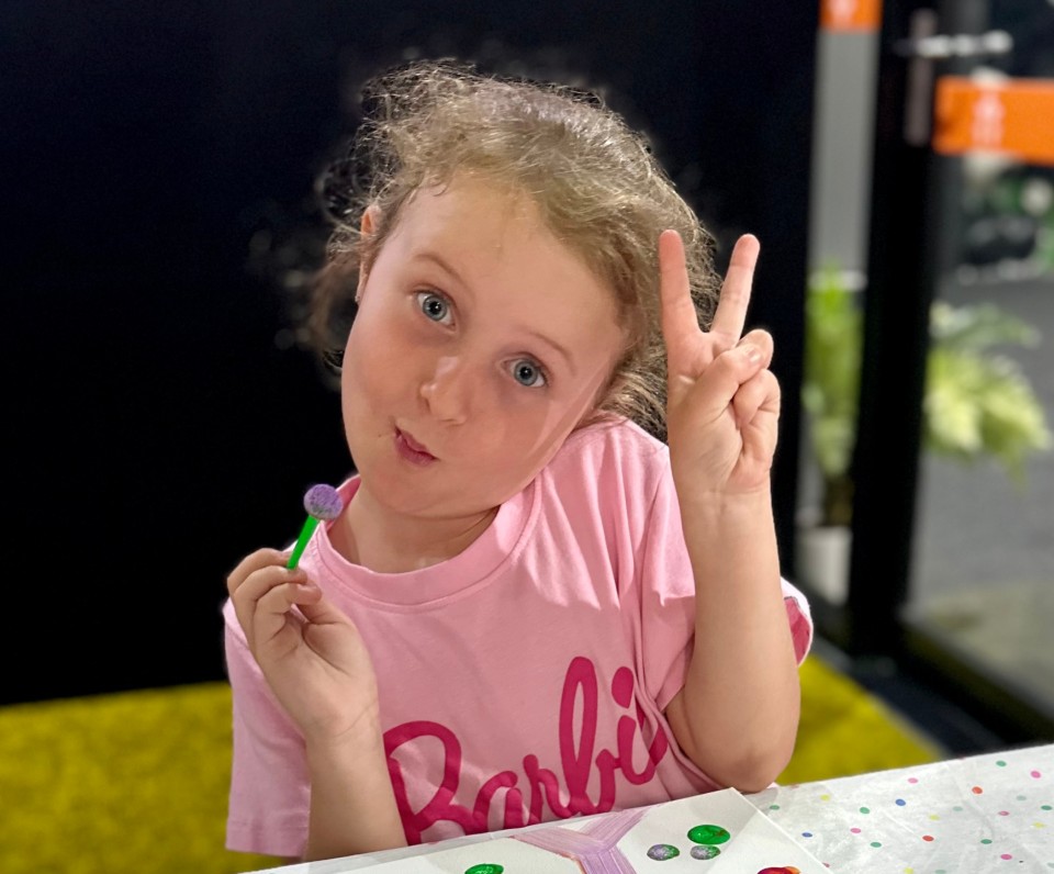 Birthday girl doing arts and crafts